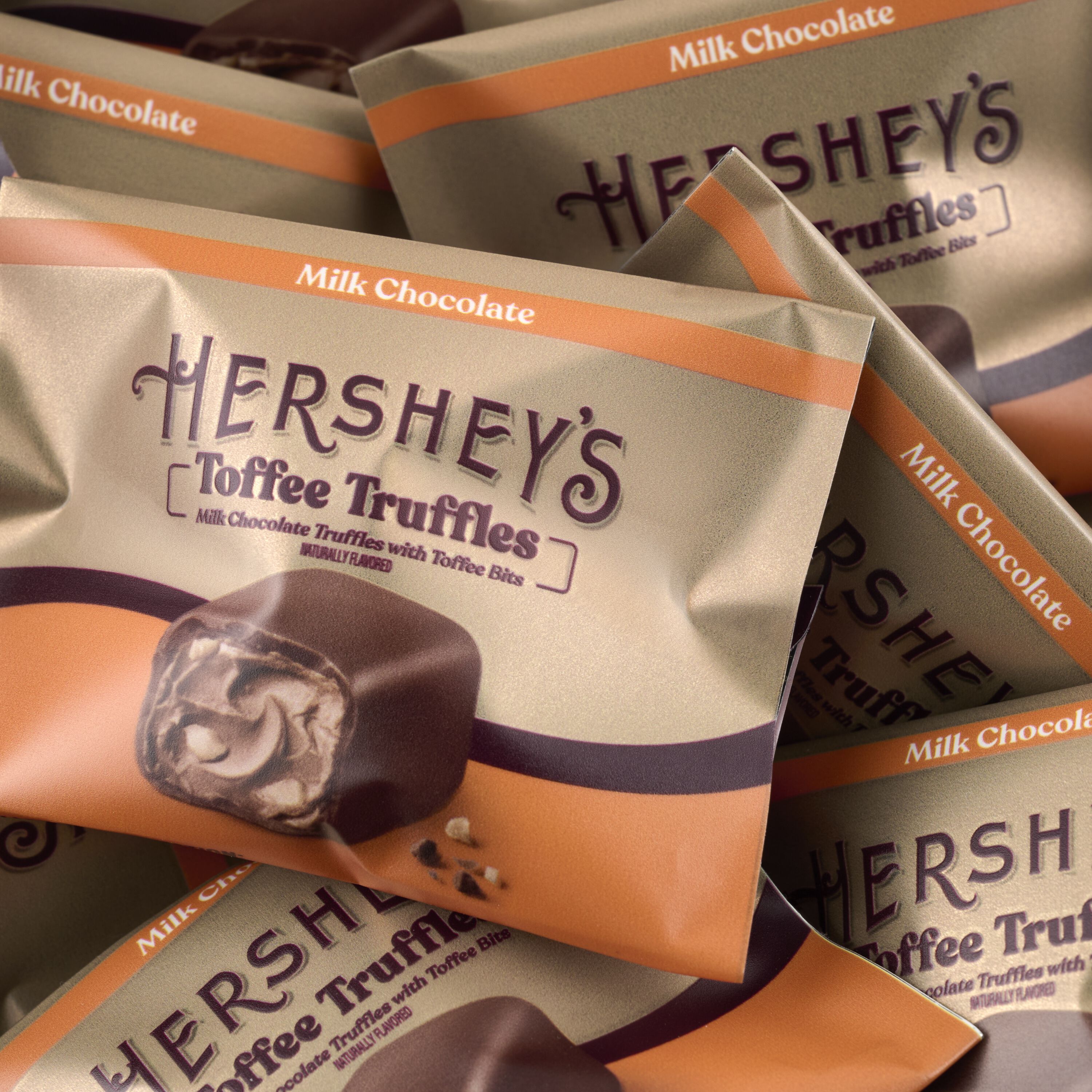 HERSHEY'S Caramels and Milk Chocolate Toffee Truffles Gold Gift Tower $39.99 4 HERSHEY'S Caramels and Milk Chocolate Toffee Truffles Gold Gift Tower $39.99